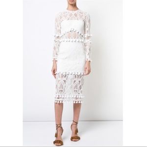ALEXIS | crochet & tassel midi dress